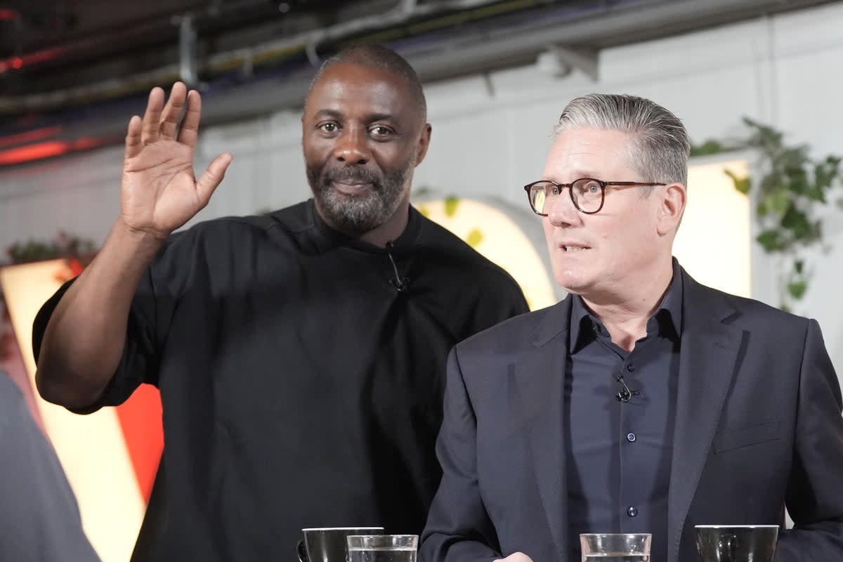 Idris Elba and Sir Keir Starmer meet families of knife-crime victims at the Lyric Theatre in Hammersmith, west London (Stefan Rousseau / PA)