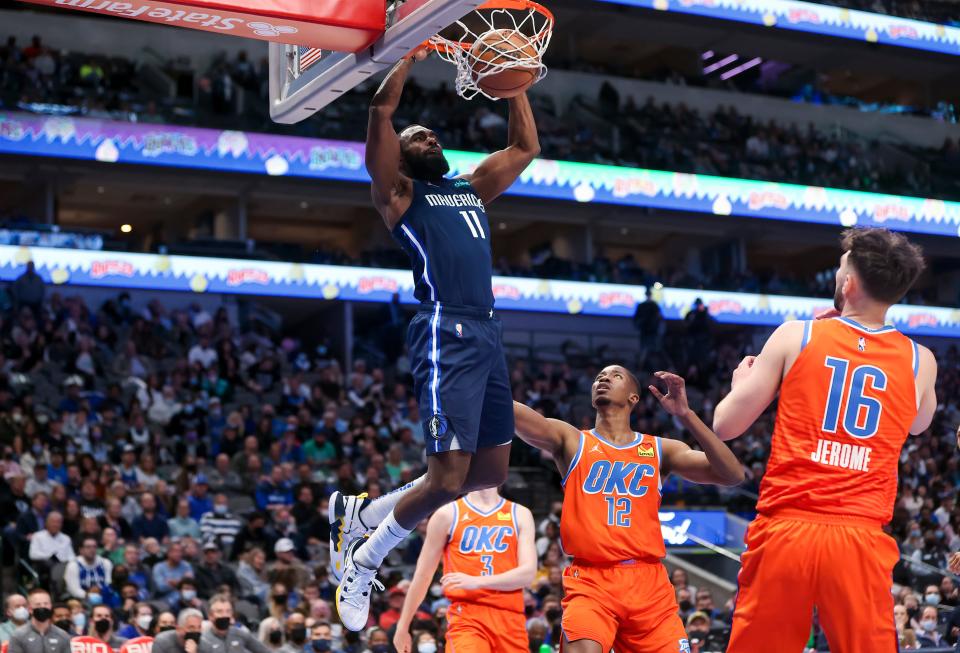 Dallas Mavericks forward Tim Hardaway Jr. (11) dunks during the second quarter of Monday's game against the Oklahoma City Thunder at American Airlines Center.