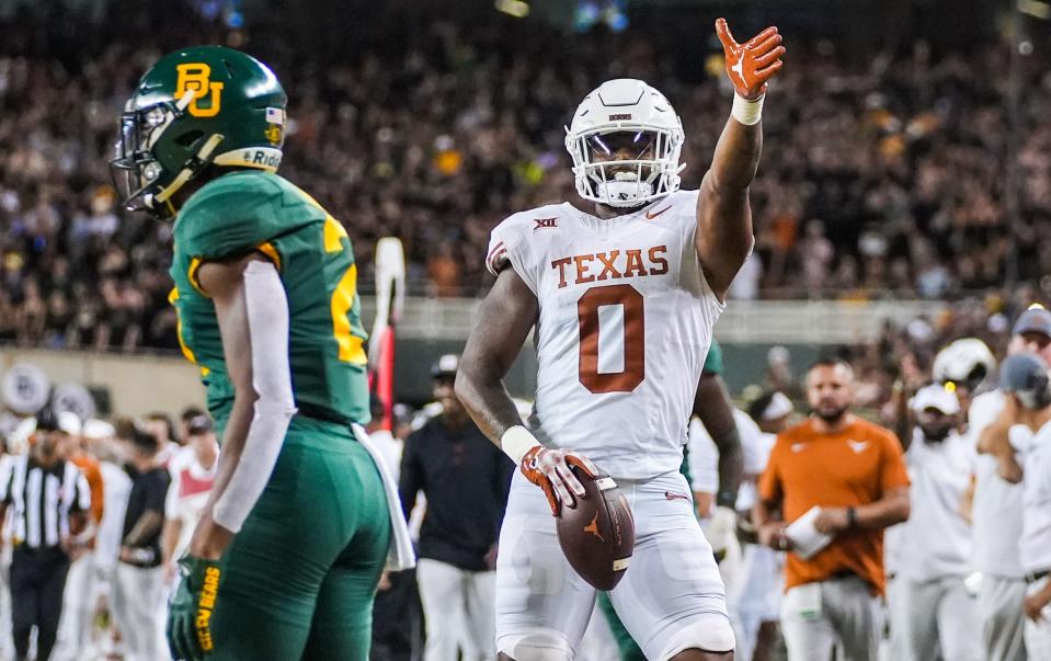 Texas tight end Ja’Tavion Sanders (0) celebrates a first down against Baylor in the second quarter of an NCAA college football game, Saturday, Sept. 23, 2023, in Waco, Texas.