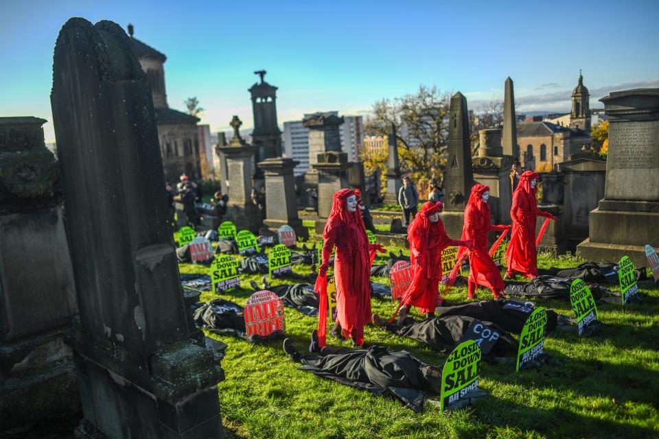 Extinction Rebellion activists are seen holding a Funeral for COP26 at the Necropolis on November 13, 2021 in Glasgow. (Getty Images)