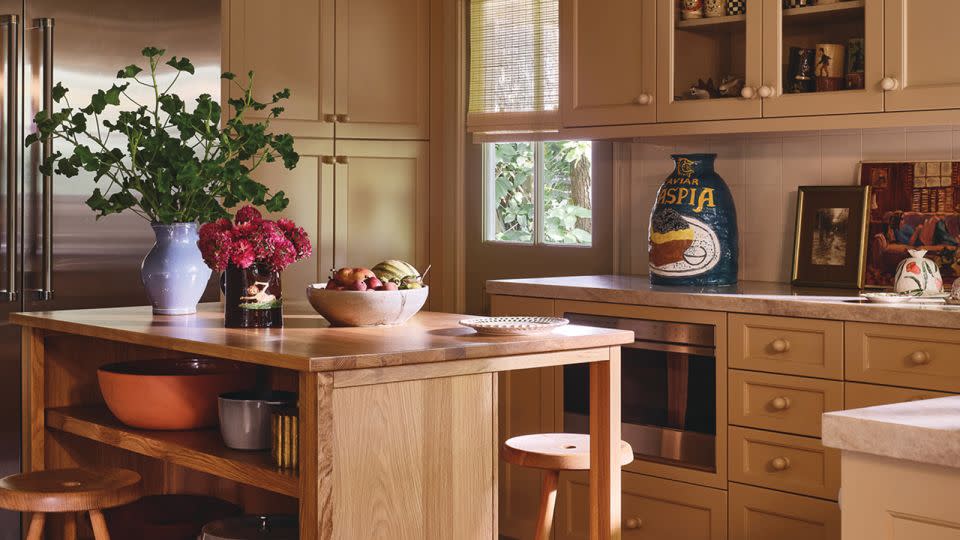 While most of the pieces in Roberts' home are antique or designer, her open kitchen includes an affordable surprise. - Michael P.H. Clifford/AD