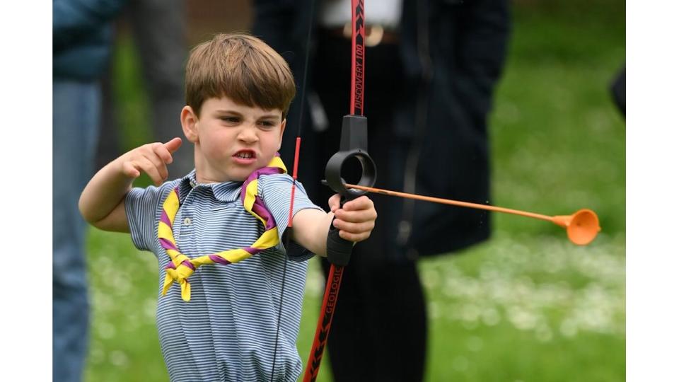 Prince Louis taking part in archery