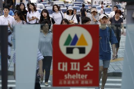 A sign of shelter is seen at an entrance of a subway station in Seoul, South Korea, August 11, 2017. REUTERS/Kim Hong-Ji