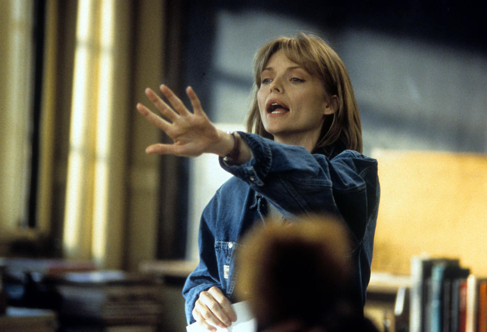 Michelle Pfeiffer teaching a class in a scene from the film 'Dangerous Minds', 1995. (Photo by Hollywood Pictures/Getty Images)