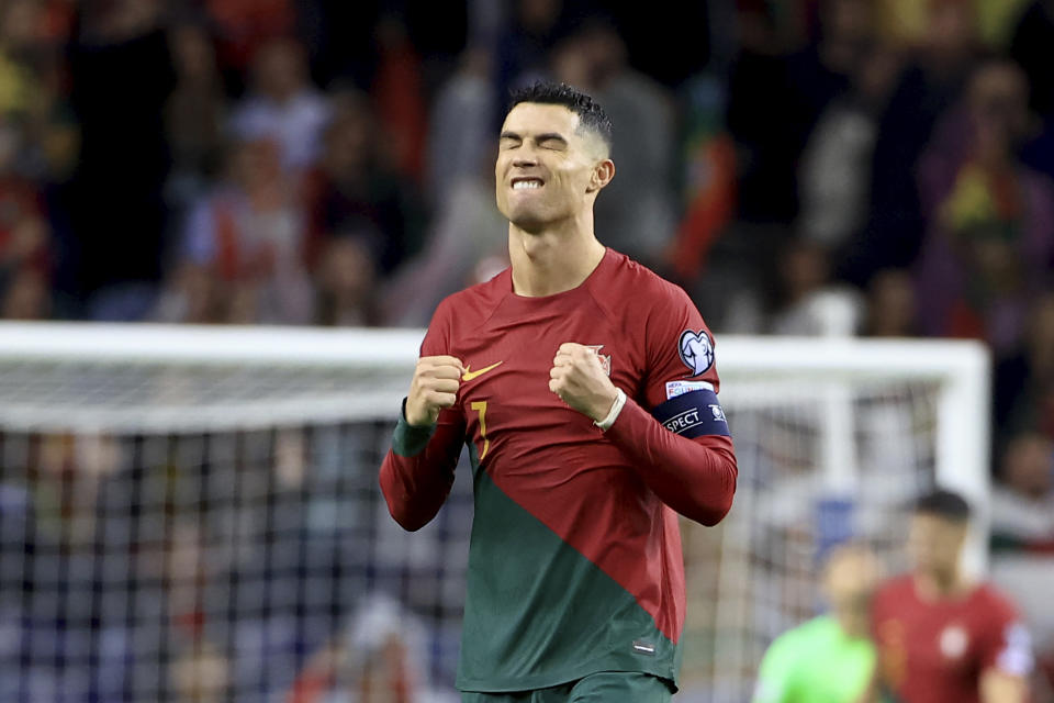 FILE - Portugal's Cristiano Ronaldo celebrates at the end of the Euro 2024 group J qualifying soccer match between Portugal and Slovakia at the Dragao stadium in Porto, Portugal, Friday, Oct. 13, 2023. The unpredictability of the European Championship, which kicks off in Munich on Friday, is what makes it such compelling viewing. Even in its expanded format of 24 teams, there is always the potential for a surprise. (AP Photo/Luis Vieira, File)