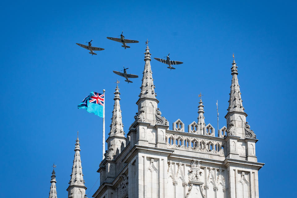 A flypast to mark the 80th anniversary of the Battle of Britain flies over Westminster Abbey, London.