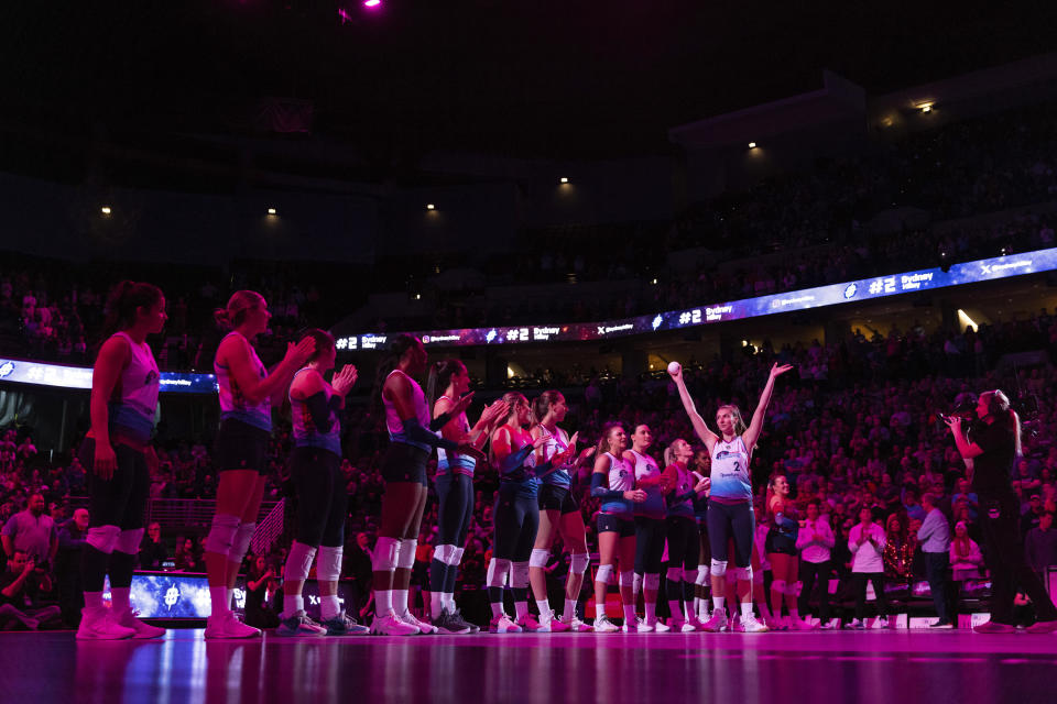 Omaha Supernovas' Sydney Hilley (2) waves to the crowd during team introductions before playing against Atlanta Vibe in a Pro Volleyball Federation game Wednesday, Jan. 24, 2024, in Omaha, Neb. (AP Photo/Rebecca S. Gratz)