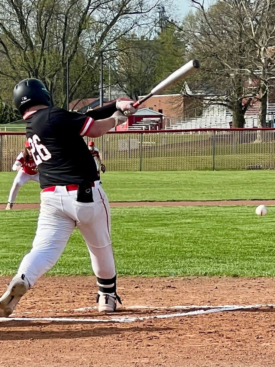 Cardington's Caden DeWitt hits the ball during a baseball game at Centerburg last week.