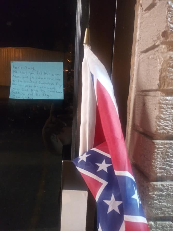 Louis Smith, a longtime local Black activist, found a Confederate and the a note addressed to him on the door of the Summerville Community Resource Center. (Credit: Louis Smith)