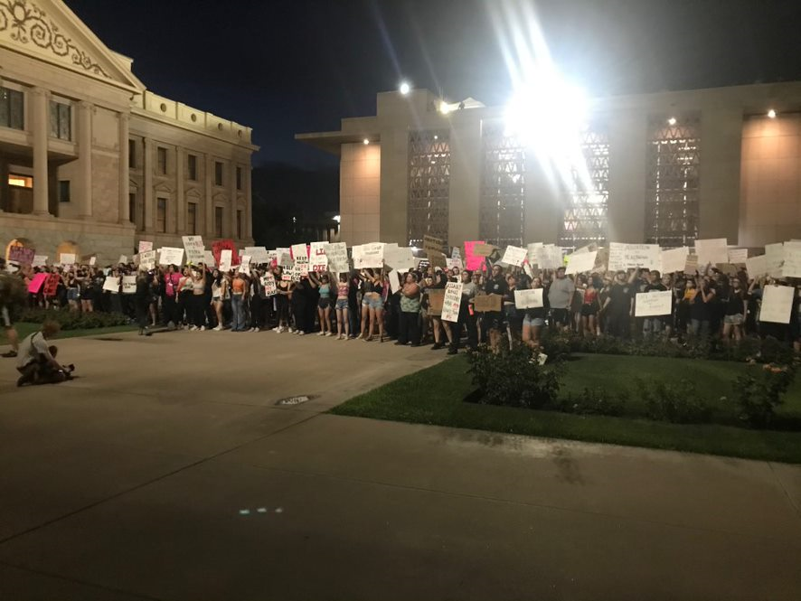 Law enforcement officials declare an unlawful assembly against people protesting for abortion rights at the Arizona Capitol in Phoenix on June 24, 2022.