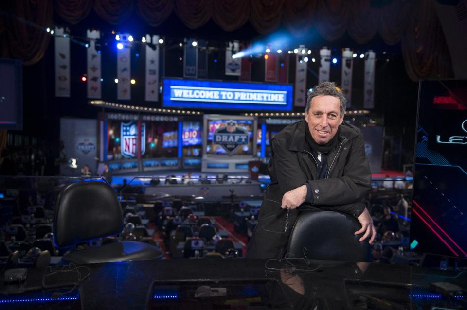 This image released by Summit Entertainment shows director Ivan Reitman on the set of "Draft Day." (AP Photo/Summit Entertainment, Dale Robinette)