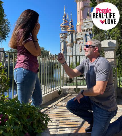 <p>courtesy Dena Smagala</p> Joe Coreno (right) proposing to Dena Smagala at Walt Disney World