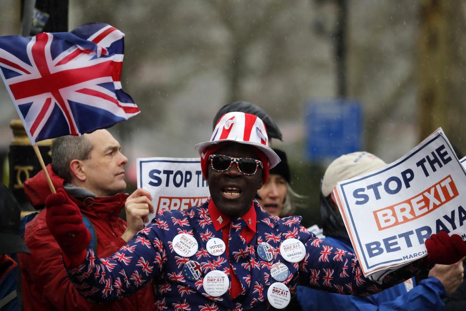 A Pro-Brexit leave the European Union supporter takes part in a protest in London, Tuesday, March 12, 2019. Britain's attorney general punctured Prime Minister Theresa May's hopes of winning backing for her Brexit deal Tuesday, saying last-minute changes secured from the European Union didn't give Britain the power to cut itself free of ties to the bloc. (AP Photo/Frank Augstein)