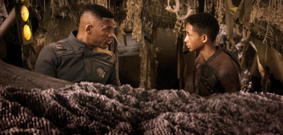 This film publicity image released by Sony - Columbia Pictures shows Will Smith, left, and Jaden Smith in a scene from "After Earth." (AP Photo/Sony, Columbia Pictures)