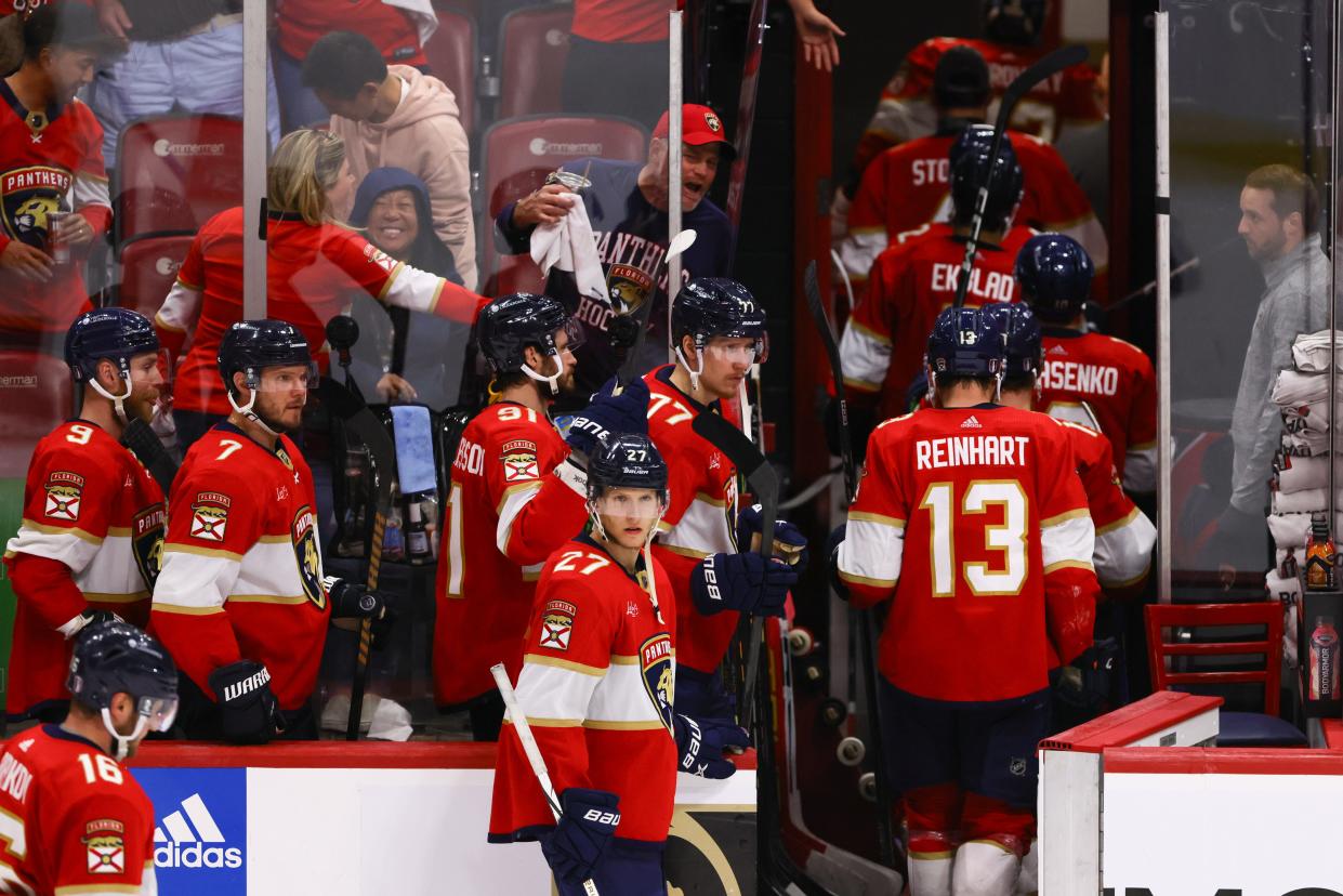 Florida Panthers players return to the locker room after the game against the Boston Bruins in game five of the second round of the 2024 Stanley Cup Playoffs at Amerant Bank Arena. Mandatory Credit: Sam Navarro-USA TODAY Sports
