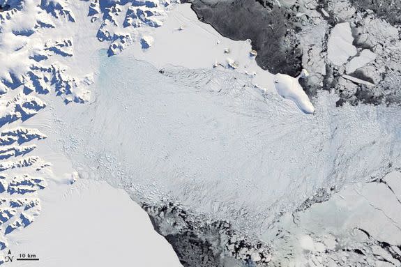 Collapse of Larsen B Ice Shelf in 2002.