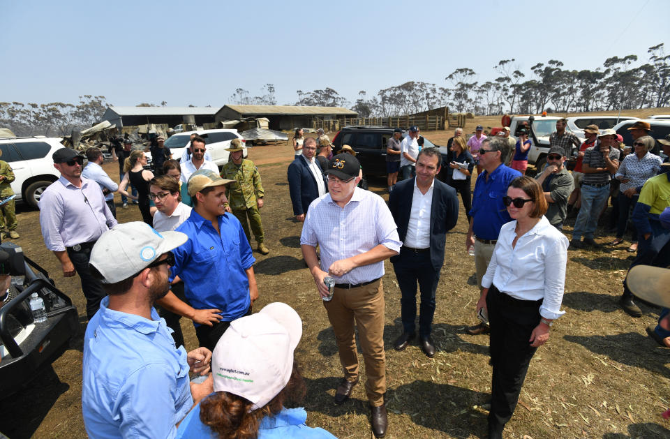 Australian Prime Minister Scott Morrison is seen visiting  a fire damaged property on Stokes Bay on Kangaroo Island last week. Source: AAP Image/David Mariuz