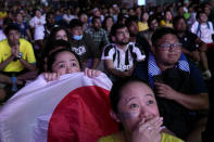 Fans watch the World Cup round of 16 soccer match between Japan and Croatia at the fan zone in Doha, Qatar, Monday, Dec. 5, 2022. (AP Photo/Ebrahim Noroozi)