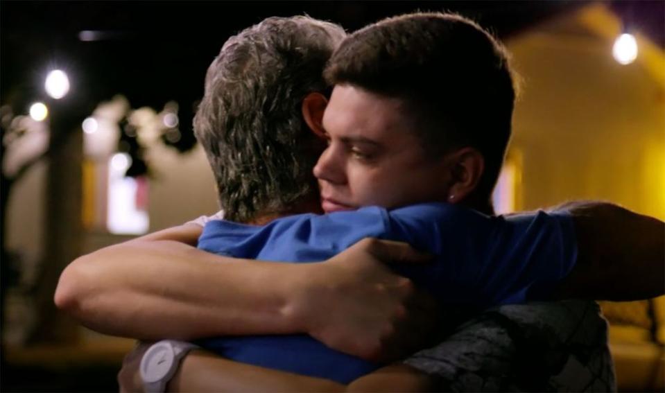 Tyler and Butch Baltierra hug goodbye as the latter returns to rehab