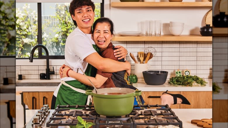 Newt Nguyen hugging his mother 