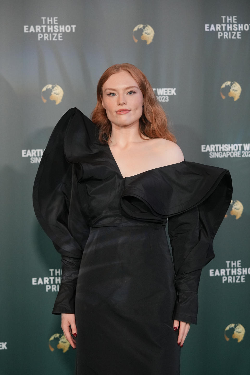 Freya Ridings poses on the green carpet for the 2023 Earthshot Prize Awards in in Singapore, Tuesday, Nov. 7, 2023. (AP Photo/Vincent Thian)