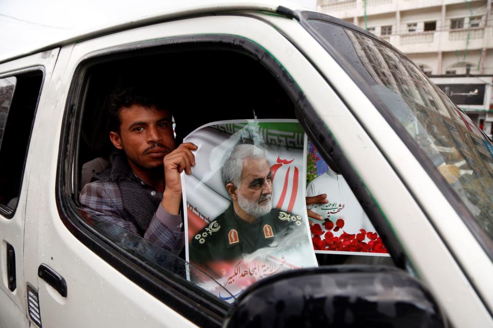 SANAA, YEMEN - JANUARY 6: People gather to protest the US air strike in Iraq that killed Iranian commander Qasem Soleimani, who headed Iran's Revolutionary Guards' elite Quds force in Sanaa, Yemen on January 6, 2020.  (Photo by Mohammed Hamoud/Anadolu Agency via Getty Images)