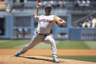 Cleveland Guardians starting pitcher Shane Bieber delivers during the first inning of a baseball game against the Los Angeles Dodgers in Los Angeles, Sunday, June 19, 2022. (AP Photo/Kyusung Gong)