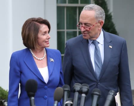 U.S. House Speaker Pelosi walks out with Senator Schumer after meeting with President Trump at the White House in Washington