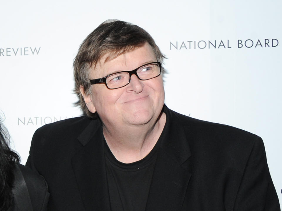 This Jan. 8, 2013 photo shows filmmaker Michael Moore at the National Board of Review Awards gala at Cipriani 42nd St. in New York. More than a decade has passed since the controversial gun control documentary "Bowling for Columbine" was released and Moore says we've yet to make any strides toward ending violence in schools. (Photo by Evan Agostini/Invision/AP)