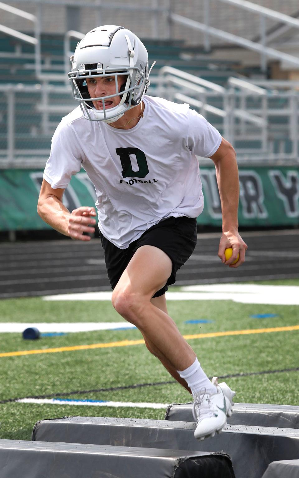 QB hopeful Finn Carley is making a move from the defense to the offense this season. The Duxbury Dragons football squad practices for the new season on Monday, Aug. 21 2023.
