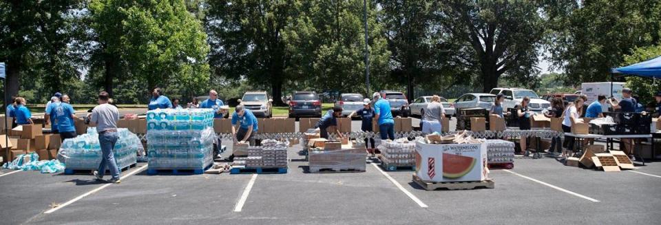 Volunteers gathered to pack 1,000 Emergency Preparedness Kits filled with food, water and other supplies to disburse to families and individuals in case of a flood or hurricane on June 18, 2021 at the Inter-faith Food Shuttle warehouse in Raleigh, N.C. The Food Shuttle, along with volunteers from Blue Cross NC and Food Lion collaborated to pack the kits.