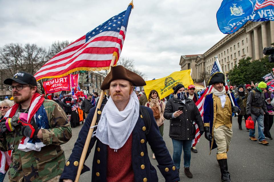 Trump supporters sporting an array of looks head toward the Capitol after he delivered an incendiary speech at a rally on the National Mall. (Photo: JOSEPH PREZIOSO via Getty Images)