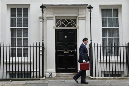 Britain's Chancellor of the Exchequer, George Osborne, walks away from number 11 Downing Street, before delivering his budget to the House of Commons, in central London March 20, 2013. REUTERS/Stefan Wermuth