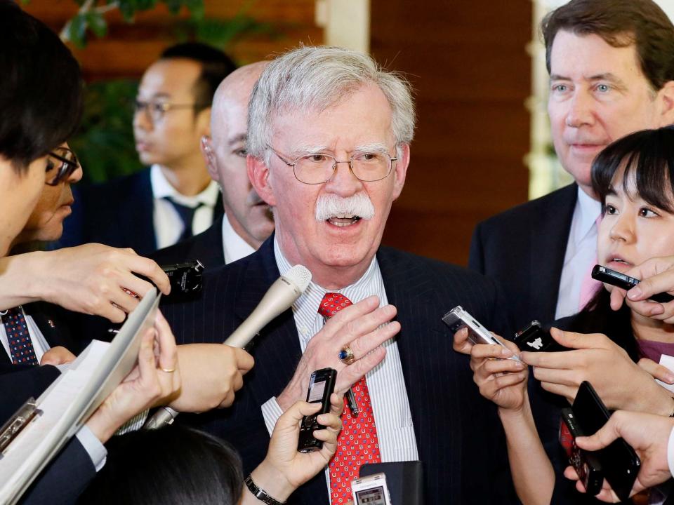 US national security adviser John Bolton has called a series of short-range missile tests by North Korea earlier this month a violation of UN Security Council resolutions and said sanctions must be kept in place.Mr Bolton also defended the recent US seizure of a North Korean cargo ship, arguing Washington’s position on the North's denuclearisation is consistent and a repeated pattern of failures to rid North Korea of nuclear weapons should be stopped.The US, however, is willing to resume talks with North Korea at any time, he added.Mr Bolton was speaking to reporters in Tokyo on Saturday ahead of Donald Trump's arrival for a four-day visit to Japan.He said North Korea tested short-range ballistic missiles on 4 and 9 May, ending a pause in launches that began in late 2017.The tests are seen as a way of pressuring Washington to compromise without actually causing the negotiations to collapse."UN Security Council resolutions prohibit North Korea from firing any ballistic missiles," Mr Bolton said. "In terms of violating UN Security Council resolutions, there is no doubt about that."Mr Trump and other officials have played down the significance of the missile tests.During his visit, Mr Trump and prime minister Shinzo Abe will "talk about making sure the integrity of the Security Council resolutions are maintained," he said.The two leaders are also expected to discuss Iran, as well as trade and the bilateral security alliance, after playing golf and watching sumo wrestling on Sunday.His comments came a day after North Korea's official media said nuclear negotiations with Washington will not resume unless the US abandons what Pyongyang describes as unilateral disarmament demands.In a statement carried by the Korean Central News Agency, the North Korean spokesperson accused the US of deliberately causing February's collapse of talks between Mr Trump and North Korea's leader Kim Jong-un by making unilateral and impossible demands.The North has also strongly protested the recent US seizure of a North Korean cargo ship that was involved in banned coal exports and demanded its immediate return.Washington says the talks broke down because North Korea demanded sanctions relief in exchange for partially surrendering its nuclear capabilities.Mr Bolton brushed off the North Korean rhetoric, saying, "I take much of what they say with a grain of salt."Calling the US seizure of the North Korean ship "appropriate," he said it may be a good time to discuss the return of the USS Pueblo, a naval intelligence ship held by the North since 1968.Mr Bolton acknowledged the US has not been "hearing much from North Korea" since the Hanoi summit.The US special envoy to North Korea, Stephen Biegun, "can't wait to talk to his North Korean counterpart but they haven't responded," he said, adding that Mr Biegun was "ready at any point to get on a plane and go anywhere."Mr Trump's visit will largely highlight close ties with Mr Abe, who is now willing to hold a summit with Mr Kim without preconditions — a recent change from his long-held hawkish stance.Mr Abe had said previously he will not meet Mr Kim unless the North takes concrete steps towards denuclearisation and resolve a decades-long dispute involving Japanese nationals abducted by North Korea.Mr Bolton said he fully supports a possible Abe-Kim summit as an additional push towards resolving North Korea's missile and nuclear threats."Given Abe's willingness to hold this meeting with Kim Jong-un ... it would be certainly in North Korea's interest to accommodate the prime minister," he said.Associated Press