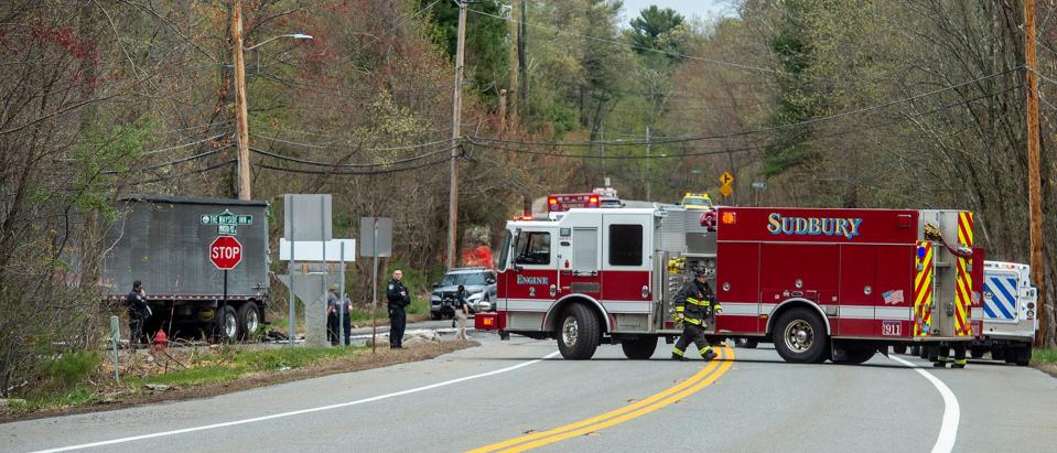 Sudbury Fire Department Engine 2 blocks the view of a vehicle involved in a crash with a tractor-trailer, left, on Boston Post Road (Route 20) in Sudbury, April 30, 2024.