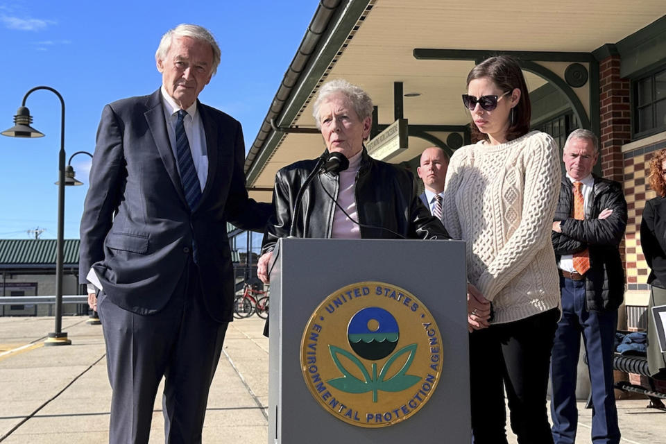 Massachusetts Sen. Edward Markey, left, stands in support of Anne Anderson, whose son died of leukemia in 1981 and was exposed to water contaminated with the chemical trichloroethylene, or TCE. The two spoke Monday, Oct. 23, 2023, in Woburn, Mass., during an EPA press conference announcing its proposal to ban the chemical. (AP Photo/Michael Casey)