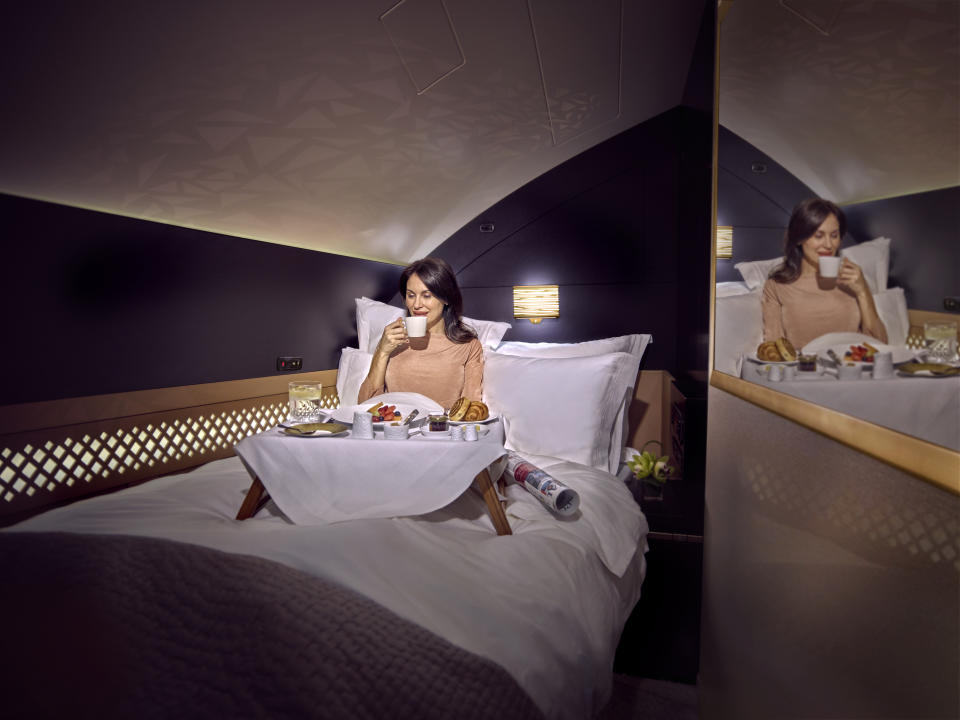 The suite comes complete with a double bed and luxury bedding. [Photo: Etihad]