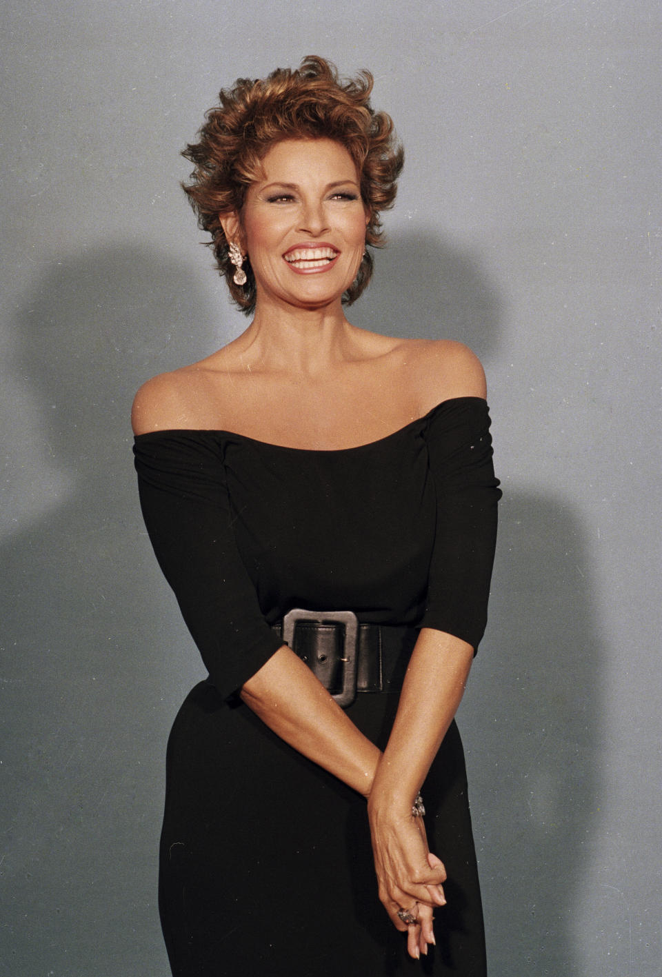 FILE - American actress Raquel Welch poses backstage at the Emmy Awards in Los Angeles on Sept. 20, 1987. Welch, whose emergence from the sea in a skimpy, furry bikini in the film “One Million Years B.C.” would propel her to international sex symbol status throughout the 1960s and '70s, died early Wednesday, Feb. 15, 2023, after a brief illness. She was 82. (AP Photo/Doug Pizac, File)