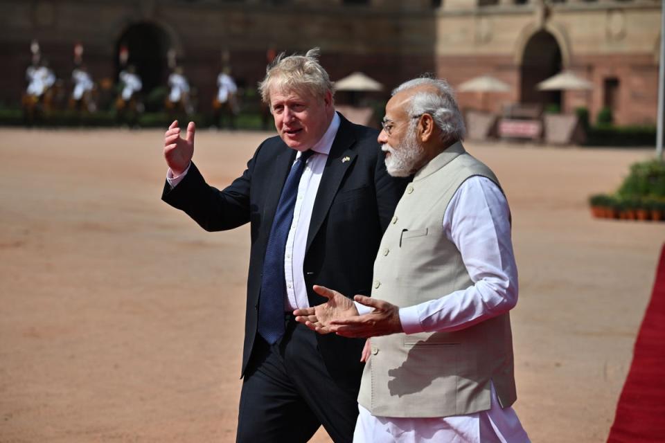 Narendra Modi (right) with Boris Johnson on his visit to India last April (Ben Stansall/PA) (PA Wire)