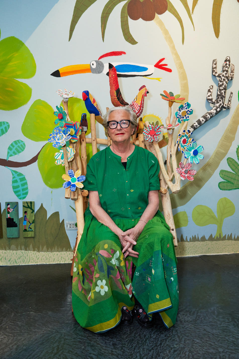 Dutch trendcaster Lidewij Edelkoort sits before an exhibit honoring the artisan craft of the Alagoas region of Brazil