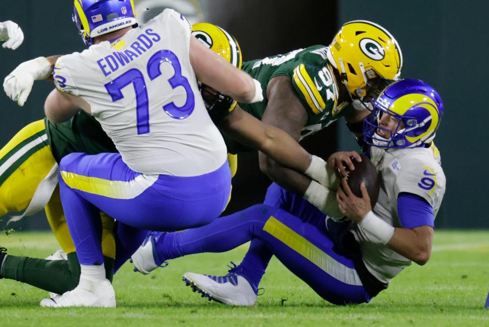 Packers' Kenny Clark sacks Rams' Matthew Stafford during the second half Sunday, Nov. 28, 2021, in Green Bay, Wis.