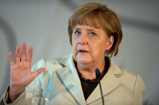 German Chancellor Angela Merkel holds a speech in Berlin during a conference organized by the German Foundation for Family Businesses on June 15. Merkel firmly warned against half-baked responses to Europe's crisis Friday as France sought to dispel any idea that moves were afoot to isolate her days before a fateful Greek vote