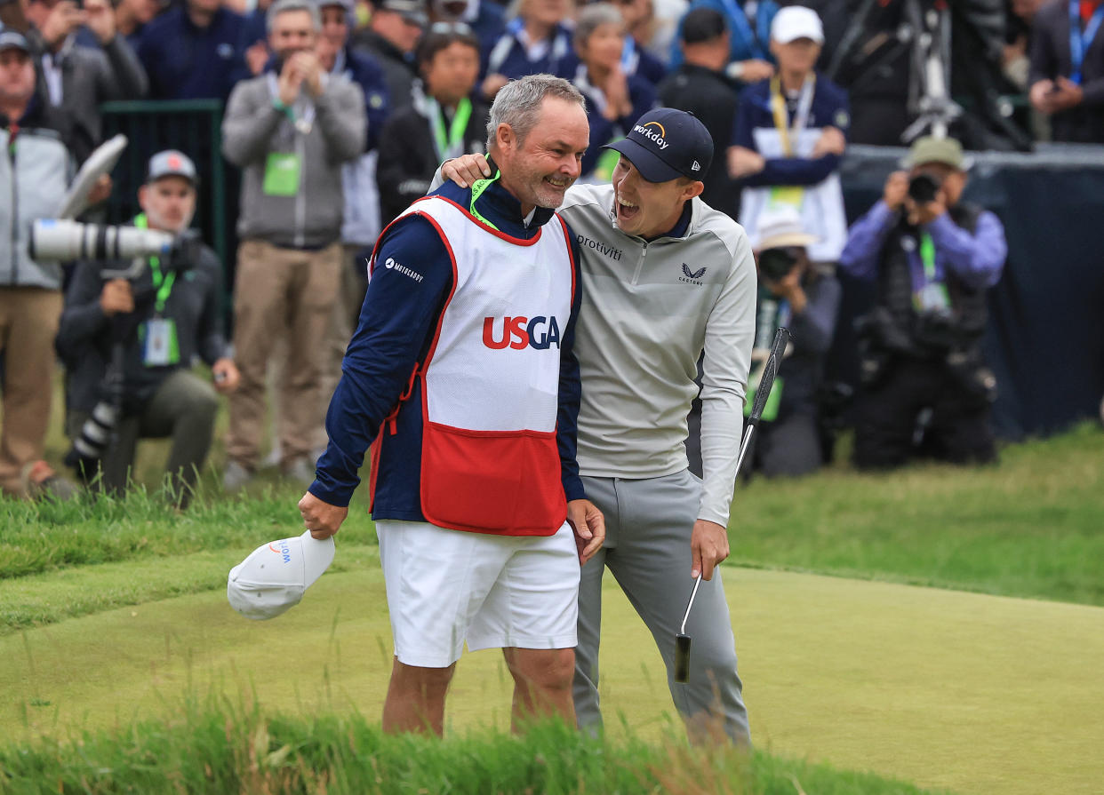 Matthew Fitzpatrick embraces his caddie Billy Foster at the U.S. Open