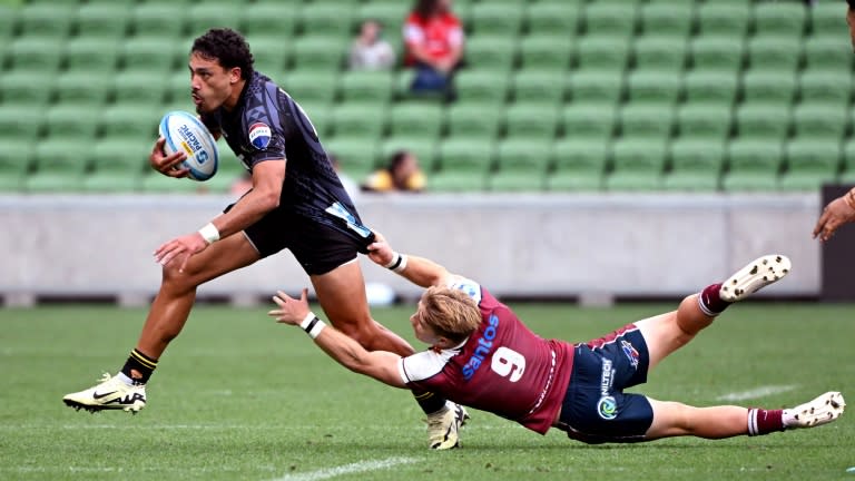 Hurricanes centre Billy Proctor (L) scored the opening try in Suva on Friday (William WEST)