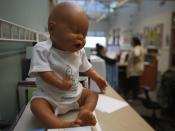 An infant doll is seen at the Women, Infants and Children (WIC) office inside a Salt Lake County health clinic in South Salt Lake City, Utah, October 2, 2013. The Salt Lake County government appropriated special funding to continue to offer certain aspects of federally funded WIC program for a week while many other WIC offices in Utah have been shut due the federal government shutdown, according to county authorities. REUTERS/Jim Urquhart (UNITED STATES - Tags: POLITICS HEALTH)