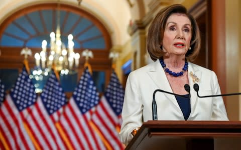 US House Speaker Nancy Pelosi announcing that articles of impeachment will be brought against President Trump - Credit: Erin Scott&nbsp;/Reuters