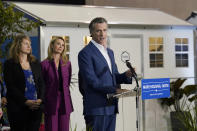 California Gov. Gavin Newsom discusses his plans to build 1,200 small homes across the state to reduce homelessness, during the first of a four-day tour of the state in Sacramento Calif., on Thursday, March 16, 2023. (AP Photo/Rich Pedroncelli)