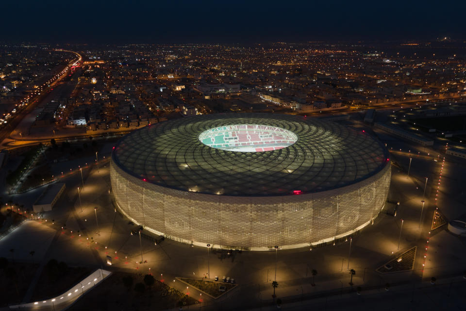 DOHA, QATAR - JUNE 22: (EDITORS NOTE: This photograph was taken using a drone) An aerial view of Al Thumama stadium at sunset on June 22, 2022 in Doha, Qatar. Designed by the architect Ibrahim M. Jaidah, the stadium&#x002019;s bold, circular form reflects the gahfiya &#x002013; a traditional woven cap adorned by men and boys all across the Middle East for centuries. Al Thumama stadium is a host venue of the FIFA World Cup Qatar 2022 starting in November. (Photo by David Ramos/Getty Images)