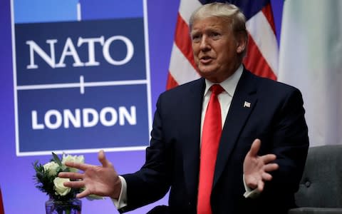 The announcement comes shortly after Donald Trump returned from the Nato summit in London - Credit: AP Photo/ Evan Vucci