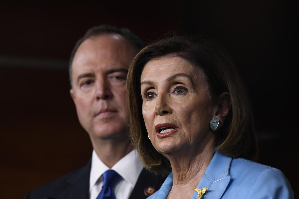 House Speaker Nancy Pelosi of Calif., joined by House Intelligence Committee Chairman Rep. Adam Schiff, D-Calif., speaks during a news conference on Capitol Hill in Washington, Wednesday, Oct. 2, 2019 (AP Photo/Susan Walsh)
